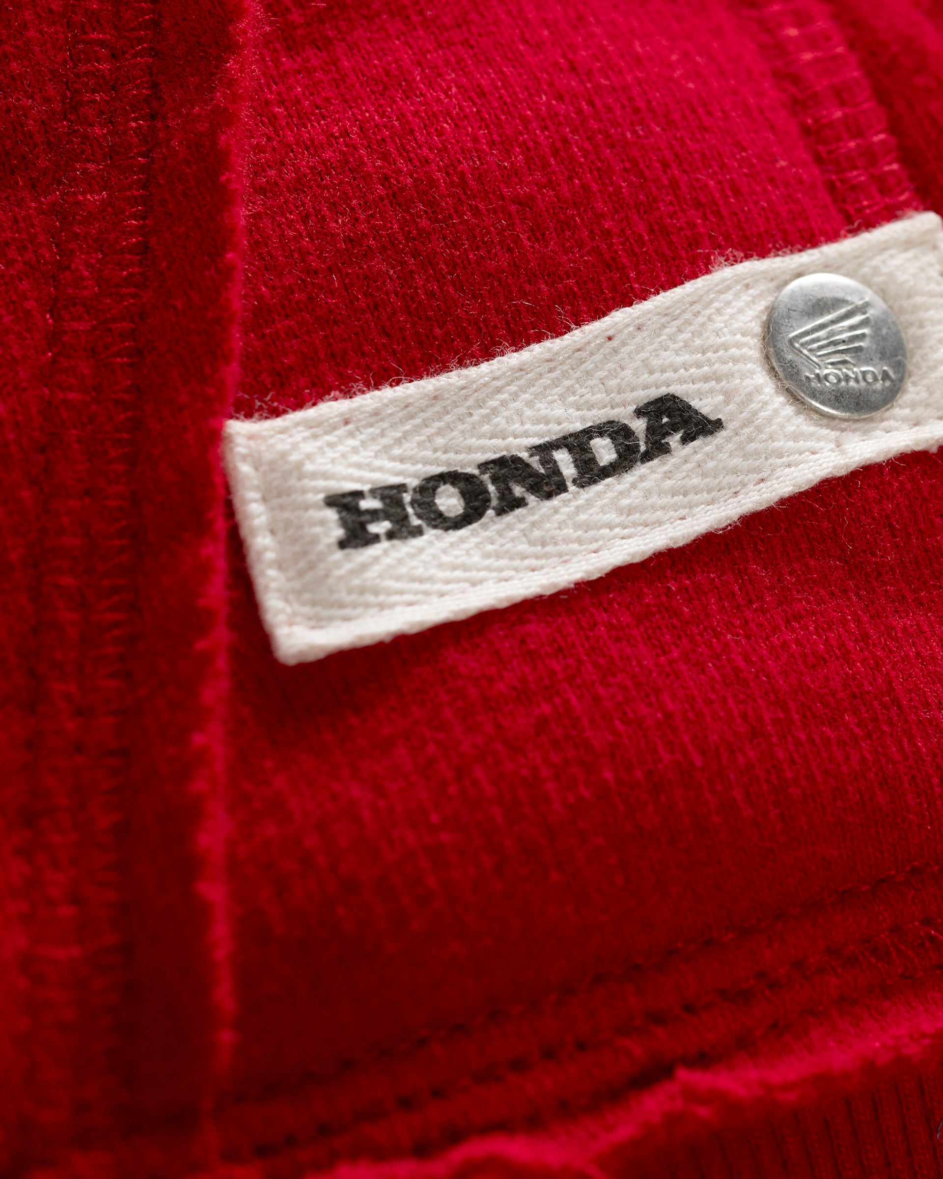 Honda Elsinore Hoodie Rot, Detailansicht Textiletikett.